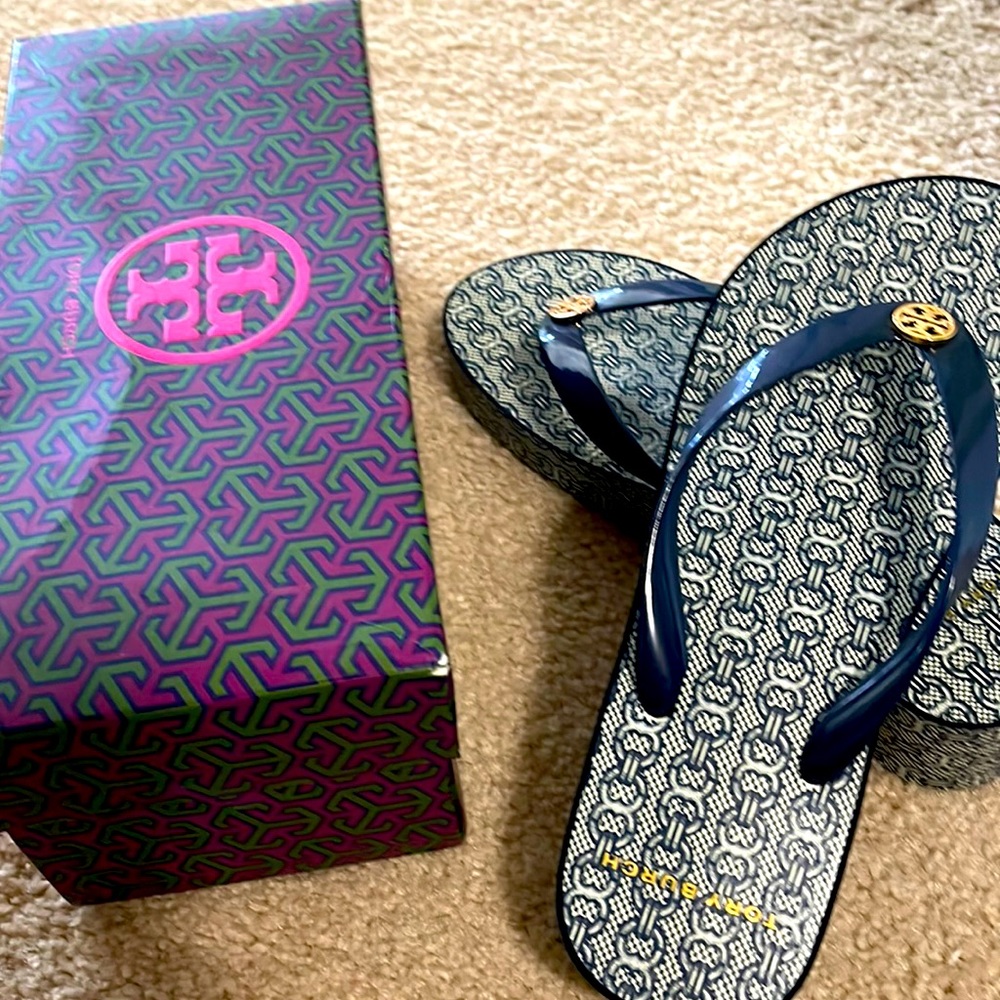 Tory Burch navy with gold symbol of Tory Burch front